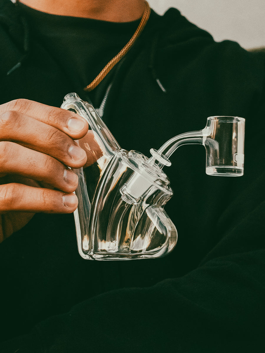 Person Holding GRAV Wedge Bubbler Rig -