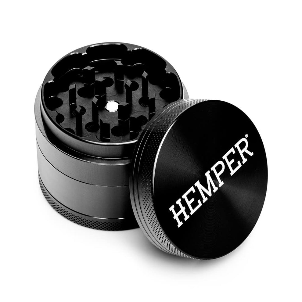 large tobacco grinder 4 inch for herbs and spices. Low Profile 1" Tall Design. Metal 4" shredder has Sharp Metal Teeth & are easier to turn. Four inches capacity zinc grinder with Four Piece - Santa Cruz